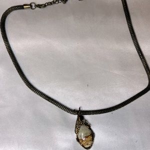 Necklace with stone pendant